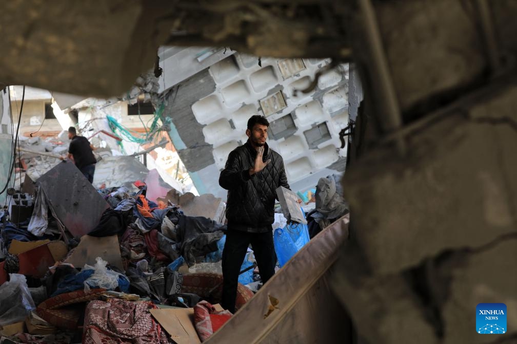 Palestinians inspect a destroyed house after an Israeli airstrike in the southern Gaza Strip city of Rafah, on April 17, 2024. The Palestinian death toll in the Gaza Strip from ongoing Israeli attacks has risen to 33,899, the Hamas-run Health Ministry said in a press statement on Wednesday.(Photo: Xinhua)