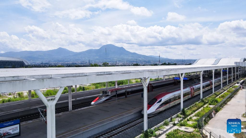 An aerial drone photo taken on April 17, 2024 shows two high-speed electrical multiple unit (EMU) trains of the Jakarta-Bandung high-speed railway at Tegalluar Station in Bandung, Indonesia. The Jakarta-Bandung High-Speed Railway marked its six months of operation on Wednesday with a total of 2.56 million passengers transported, said PT Kereta Cepat Indonesia-China (KCIC), a joint venture consortium between Indonesian and Chinese state-owned firms that constructs and runs the HSR.(Photo: Xinhua)