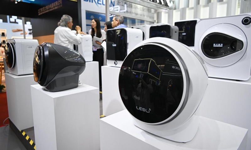 Dryers are displayed at the 135th session of the China Import and Export Fair, also known as the Canton Fair, in Guangzhou, south China's Guangdong Province, April 15, 2024. The 135th session of the Canton Fair opened Monday in Guangzhou. The smart life product zone of the fair attracted nearly 200 exhibitors and numerous visitors.(Photo: Xinhua)