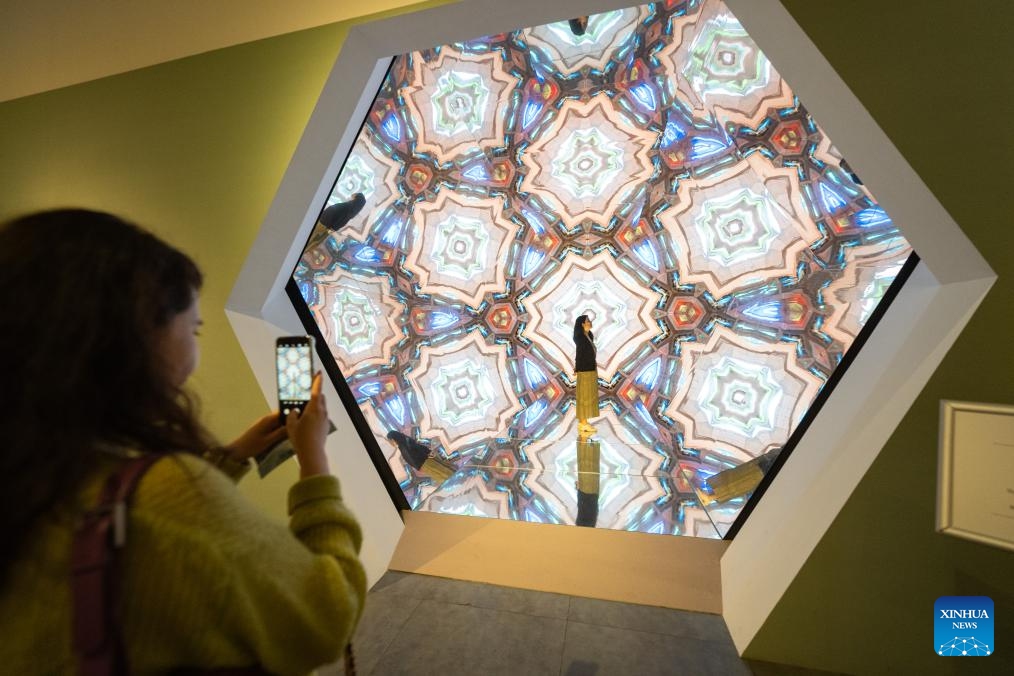 Visitors take photos at an exhibition titled Gaudi: Moment is Eternity in Wuhan, central China's Hubei Province, April 18, 2024. Opened here on Thursday, the exhibition will last until October 20.(Photo: Xinhua)
