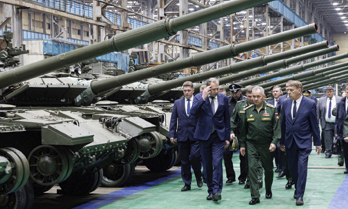 Russian Defense Minister Sergei Shoigu, visits a factory workshop on April 19, 2024, as he checks the implementation of the state defense order at an enterprise of the military-industrial complex in the Omsk region of Russia, which produces tanks and heavy flamethrower systems. Photo: VCG