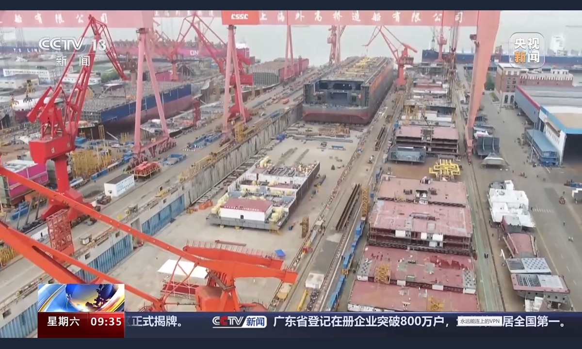 China's second domestically built large cruise ship on April 20, 2024 enters a dock at the No.2 dock of its builder Shanghai Waigaoqiao Shipbuilding Co (Photo: CCTV)