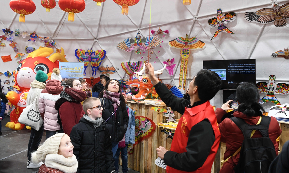 French visitors come to see the display of Chinese traditional kites at the 37th International Kite Festival in Berck-sur-Mer, France, on April 20, 2024. China is the guest country of honor at the festival which is held from April 20 to 28, 2024. Photo: cnsphoto
