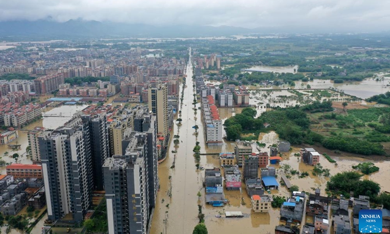 An aerial drone photo taken on April 21, 2024 shows a submerged area in Hanguang Town of Qingyuan, south China's Guangdong Province. A total of 38 hydrological stations at 24 rivers in south China's Guangdong Province have reported water levels surpassing the alert threshold as of 4 p.m. on Sunday, according to the provincial department of water resources. (Xinhua/Huang Guobao)