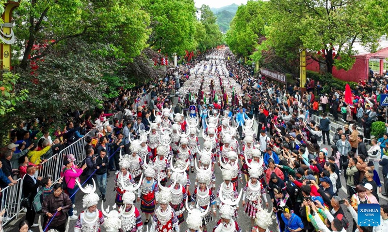 In this drone photo, people of Miao ethnic group attend a parade to celebrate the Miao Sisters Festival in Taijiang County, southwest China's Guizhou Province, April 21, 2024.