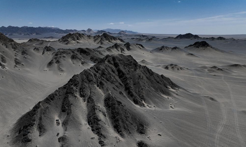 An aerial drone photo taken on April 21, 2024 shows a view of Heidu Mountain in Lenghu Town in the Mongolian-Tibetan Autonomous Prefecture of Haixi, northwest China's Qinghai Province. The Qaidam Basin in northwest China is home to a unique landscape which consists of salt lakes, the Gobi desert and the wind-eroded rocks known as yardang. Photo: Xinhua