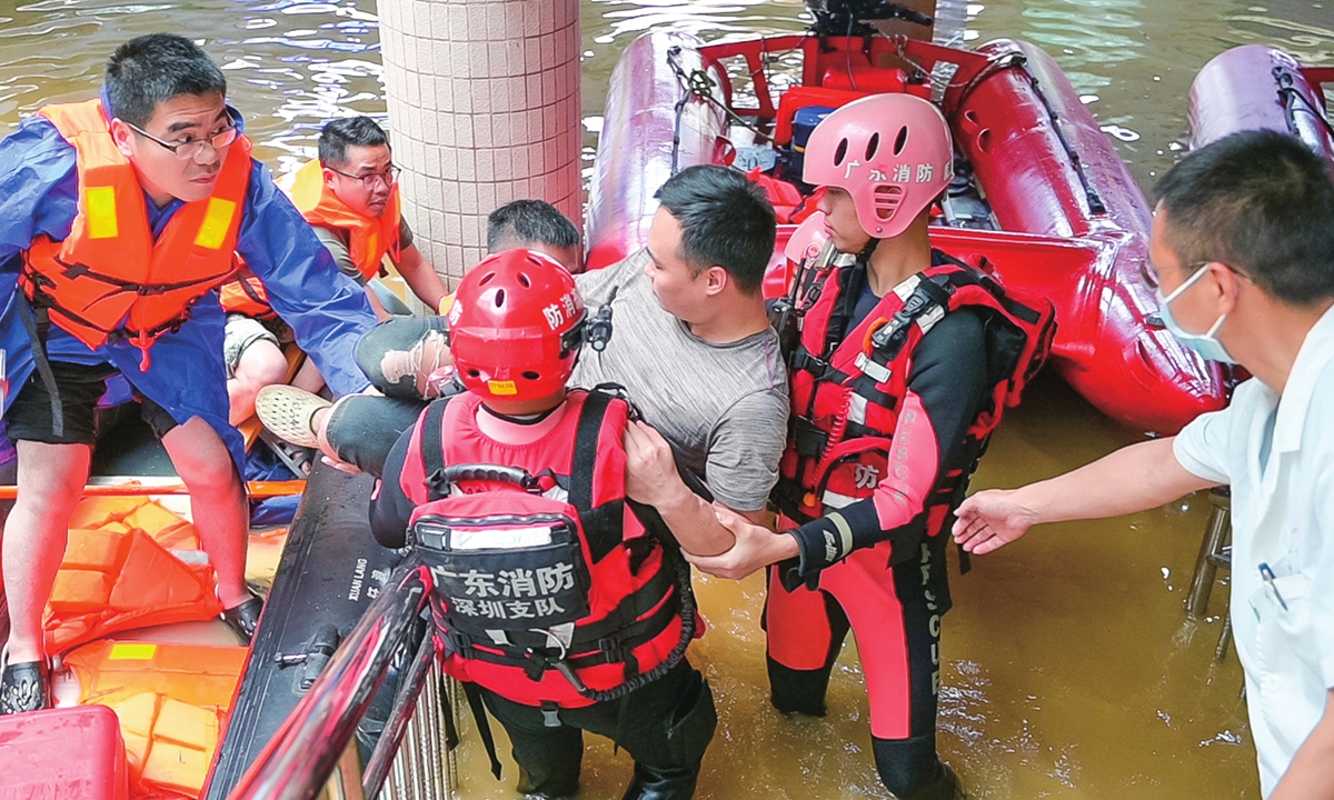 Rescuers work to help relocate residents in Hanguang Town of Qingyuan, South China's Guangdong Province on April 22, 2024, after continuous heavy rainfall hit many parts of Guangdong in recent days. Guangdong has so far relocated some 110,000 residents, with 25,800 people being urgently resettled. Four people were killed and 10 others remain missing. Photo: cnsphoto