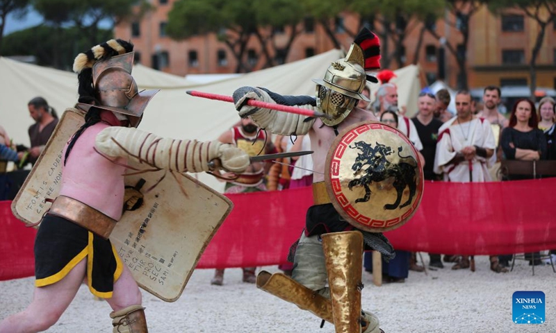 People participate in the gladiator tournament at Circus Maximus in Rome, April 20, 2024. The city of Rome celebrated its 2,777th birthday on Sunday with a weekend of historical re-enactments of ancient Roman rituals. (Xinhua/Li Jing)