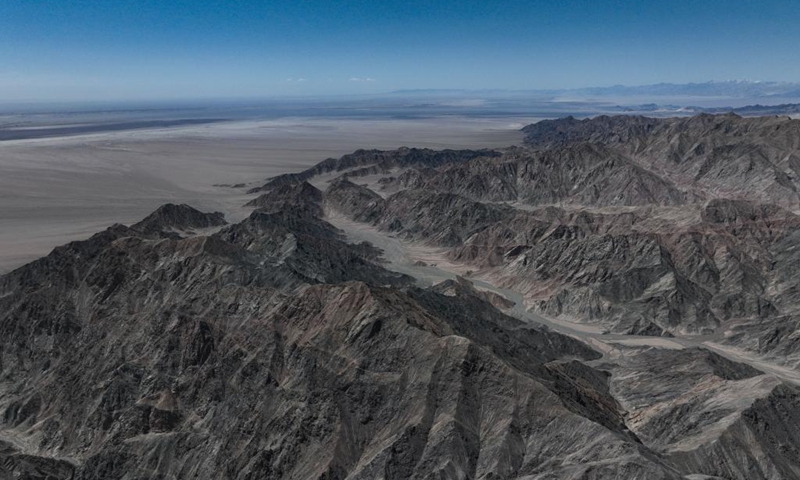 An aerial drone photo taken on April 20, 2024 shows a view of Serteng Mountain in Lenghu Town in the Mongolian-Tibetan Autonomous Prefecture of Haixi, northwest China's Qinghai Province. The Qaidam Basin in northwest China is home to a unique landscape which consists of salt lakes, the Gobi desert and the wind-eroded rocks known as yardang. Photo: Xinhua