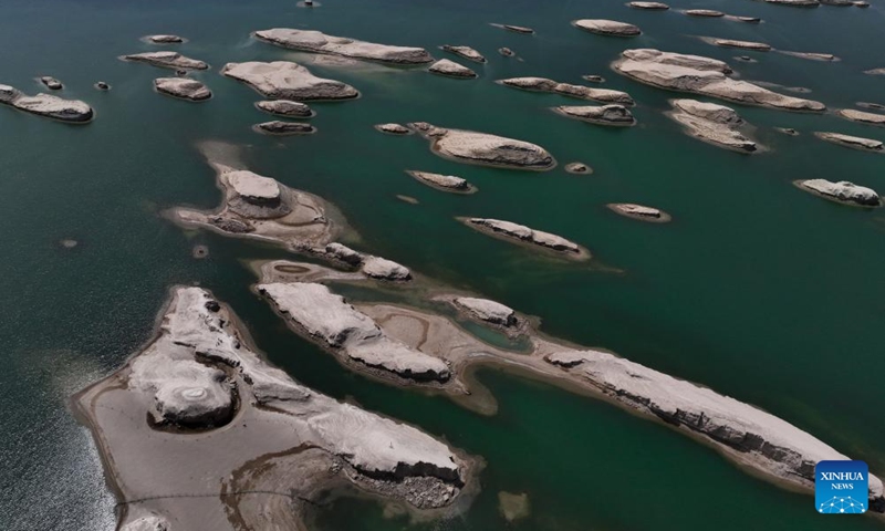 An aerial drone photo taken on April 22, 2024 shows a view of Wusute Yardang geological park in the Mongolian-Tibetan Autonomous Prefecture of Haixi, northwest China's Qinghai Province. The Qaidam Basin in northwest China is home to a unique landscape which consists of salt lakes, the Gobi desert and the wind-eroded rocks known as yardang. Photo: Xinhua