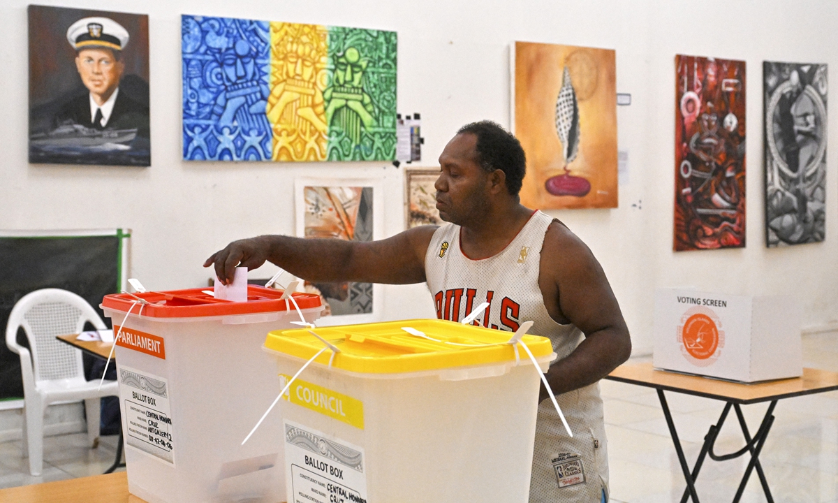 A voter casts his ballot during the Solomon Islands' elections in the capital Honiara, on April 17, 2024. Photo: VCG