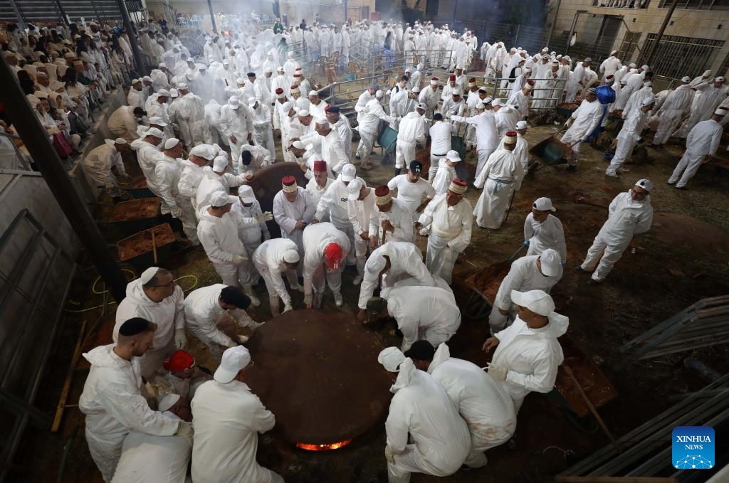 Members of the Samaritan sect participate in the traditional Passover sacrifice on Mount Gerizim, near the West Bank city of Nablus, on April 22, 2024.(Photo; Xinhua)