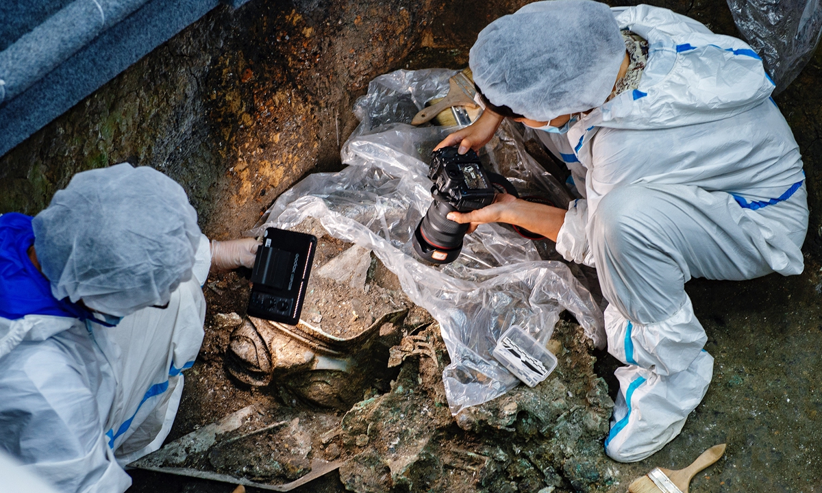 Experts excavate relics at the Sanxingdui Ruins site in Guanghan, Southwest China's Sichuan Province, on September 28, 2021. Photo: VCG
