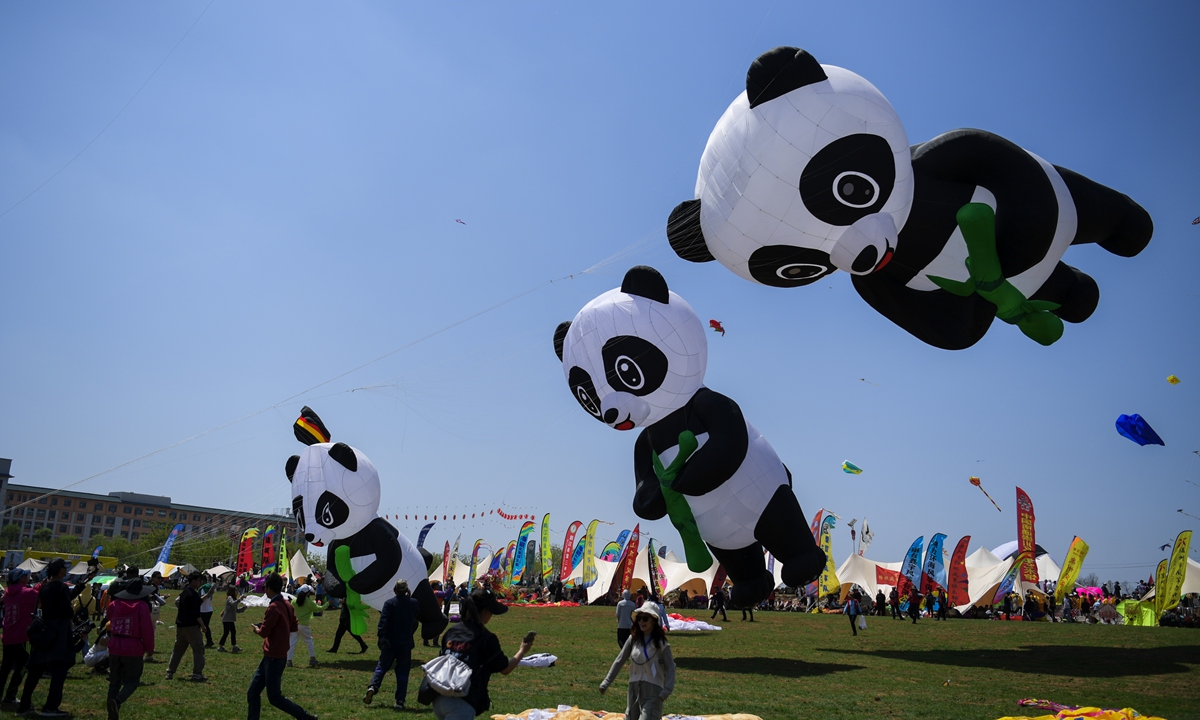 People fly kites at the Weifang International Kite Festival in Weifang, Shandong Province, on April 20, 2024. Photo: VCG