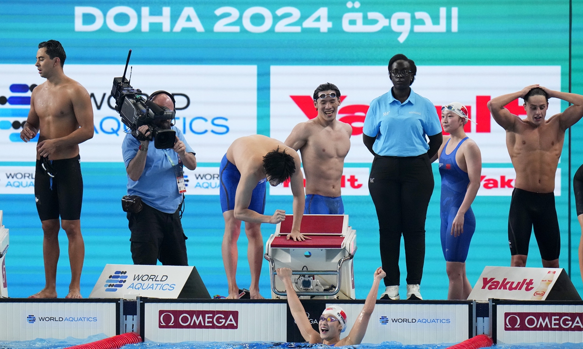 Yu Yiting (in water) of Team China celebrates after the mixed 4x100m freestyle final at the World Aquatics Championships on February 17, 2024 in Doha, Qatar. Photo: VCG