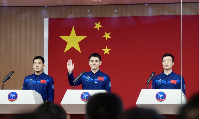 Ye Guangfu (C), Li Cong (R) and Li Guangsu, the three Chinese astronauts for the upcoming Shenzhou-18 spaceflight mission, meet the press at the Jiuquan Satellite Launch Center in northwest China, April 24, 2024. Photo: Fan Anqi/GT