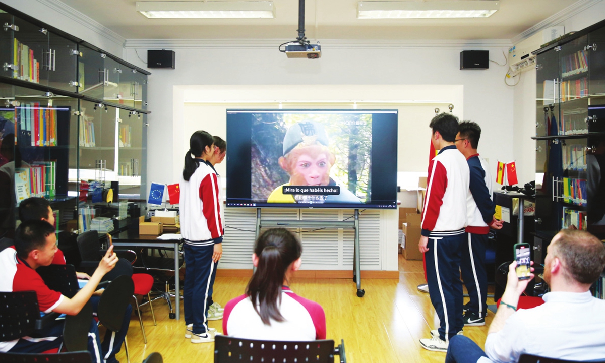 Students from Beijing Gucheng Middle School perform voice-over from the Chinese classic Journey to the West. Photo: Courtesy of Embassy of Spain in China