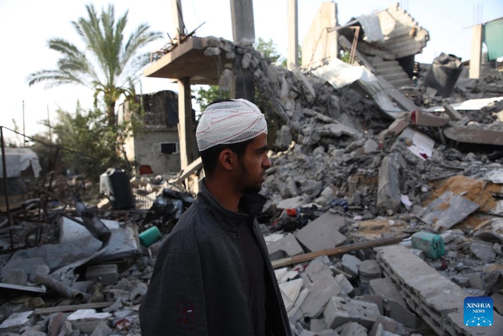 A Palestinian man inspects a destroyed house in the southern Gaza Strip city of Rafah, on April 24, 2024. The Palestinian death toll in the Gaza Strip from ongoing Israeli attacks has risen to 34,262, the Hamas-run Health Ministry said on Wednesday.(Photo: Xinhua)
