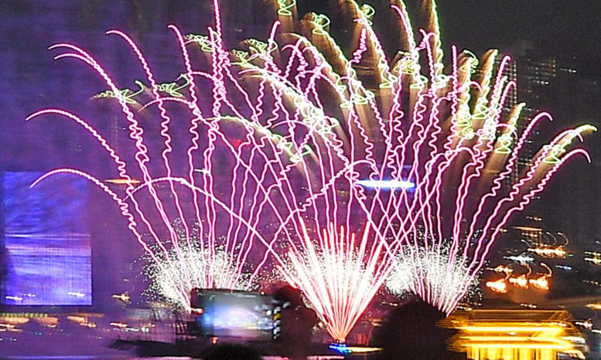People watch a firework show at the Victoria Harbor in Hong Kong, south China, May 1, 2024. Photo:Xinhua