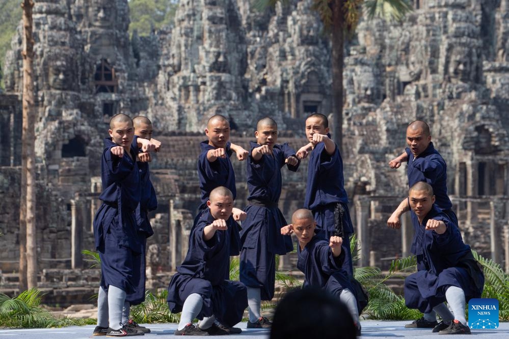 China's Shaolin Kung Fu martial artists perform at the northern part of Bayon Temple in the complex of the Angkor Archaeological Park in Siem Reap province, Cambodia, April 24, 2024. China's Shaolin Kung Fu martial artists and Cambodian Bokator martial artists on Wednesday jointly performed When Shaolin Meets Bokator at the famed Angkor Archaeological Park, attracting crowds of spectators.(Photo: Xinhua)