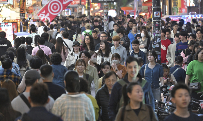 A crowd of people in Namba district, a hustle-bustle area in Osaka Prefecture, Japan on April 27, 2024. Photo: VCG