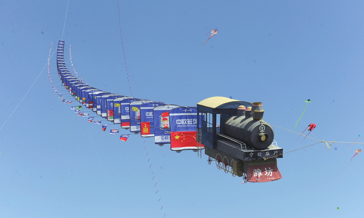 A giant kite themed after the China-Europe Railway Express is flown at the 20th World Kite Championship in Weifang, East China's Shandong Province, on April 20, 2024. Photo: VCG