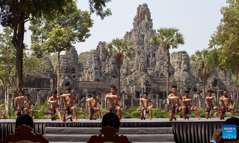 Cambodian Bokator martial artists perform at the northern part of Bayon Temple in the complex of the Angkor Archaeological Park in Siem Reap province, Cambodia, April 24, 2024. China's Shaolin Kung Fu martial artists and Cambodian Bokator martial artists on Wednesday jointly performed When Shaolin Meets Bokator at the famed Angkor Archaeological Park, attracting crowds of spectators.(Photo: Xinhua)