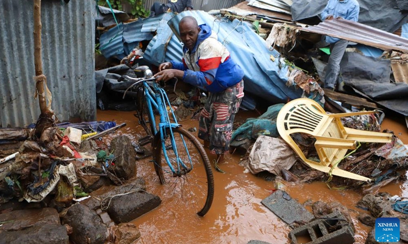 Residents salvage their belongings after heavy rains in the Mathare slums of Nairobi, Kenya, on April 24, 2024. Kenya is experiencing heavy rains that have disrupted normal business across the East African country, resulting in the loss of more than 38 lives and the destruction of property.(Photo: Xinhua)