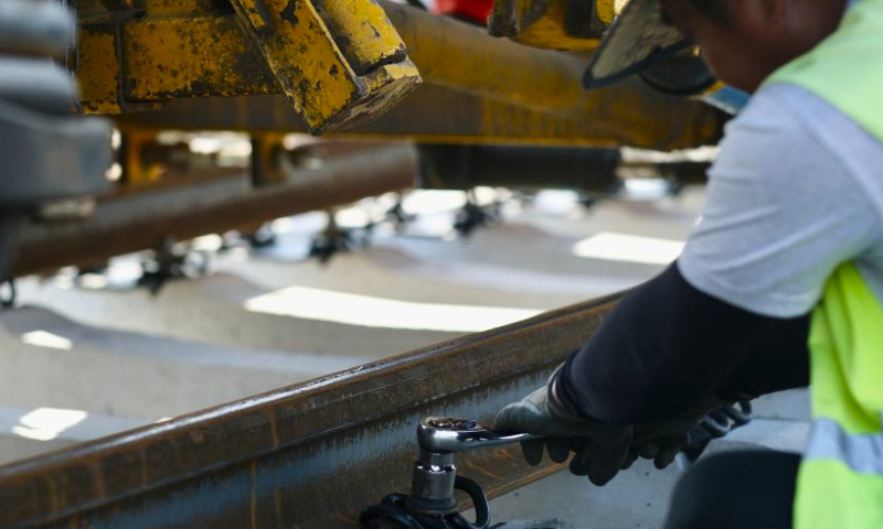 A construction worker of the Belgrade-Budapest railway project works on the tracks on the Novi Sad-Subotica section in Sajlovo, Serbia, on April 11, 2024. Once operational, the high-speed railway will be equipped with modern signaling and safety systems, significantly reducing travel time between the two cities. (Xinhua/Zheng Kaijun)