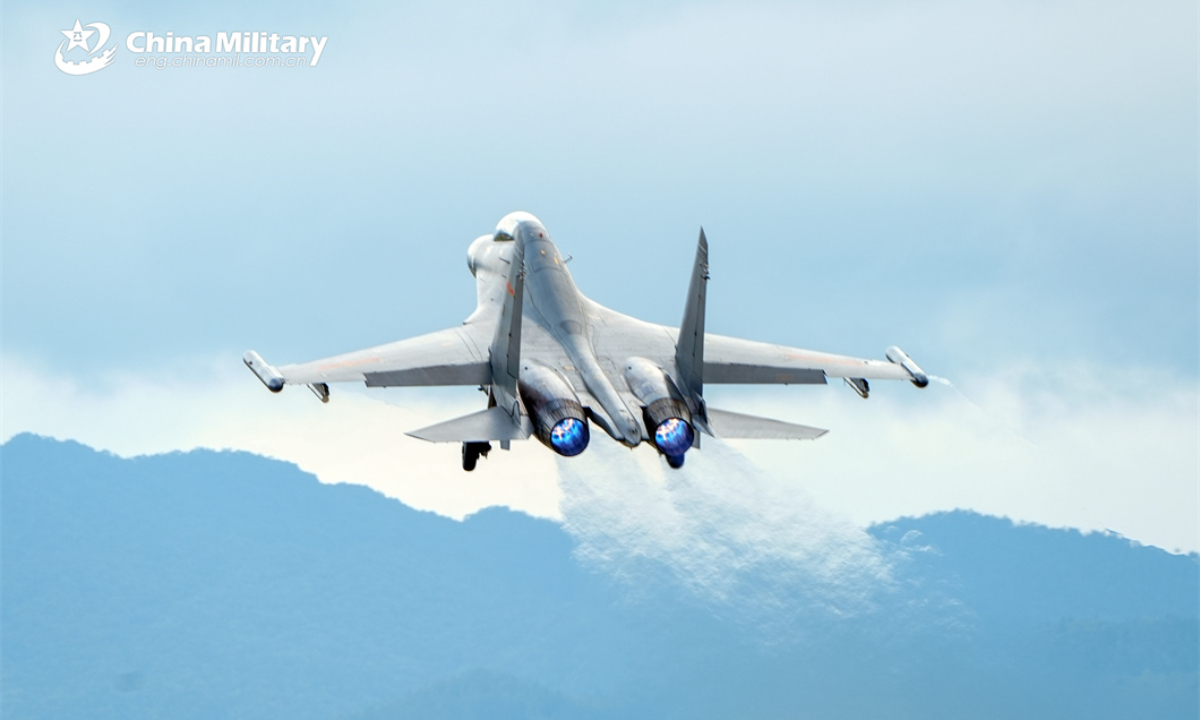A fighter jet attached to an aviation brigade with the air force under the Chinese PLA Eastern Theater Command soars into the air during a round-the-clock flight training exercise on April 8, 2024. Photo:China Military