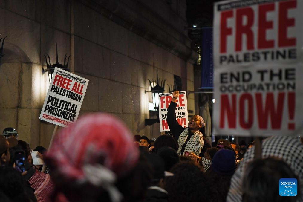 A protester chants slogans during a pro-Palestinian demonstration outside Columbia University in New York, the United States, on April 24, 2024. Columbia University, amidst an eighth day of tense demonstrations, said on Wednesday that it has extended negotiations with student activists regarding the dismantling of a pro-Palestinian encampment.(Photo: Xinhua)