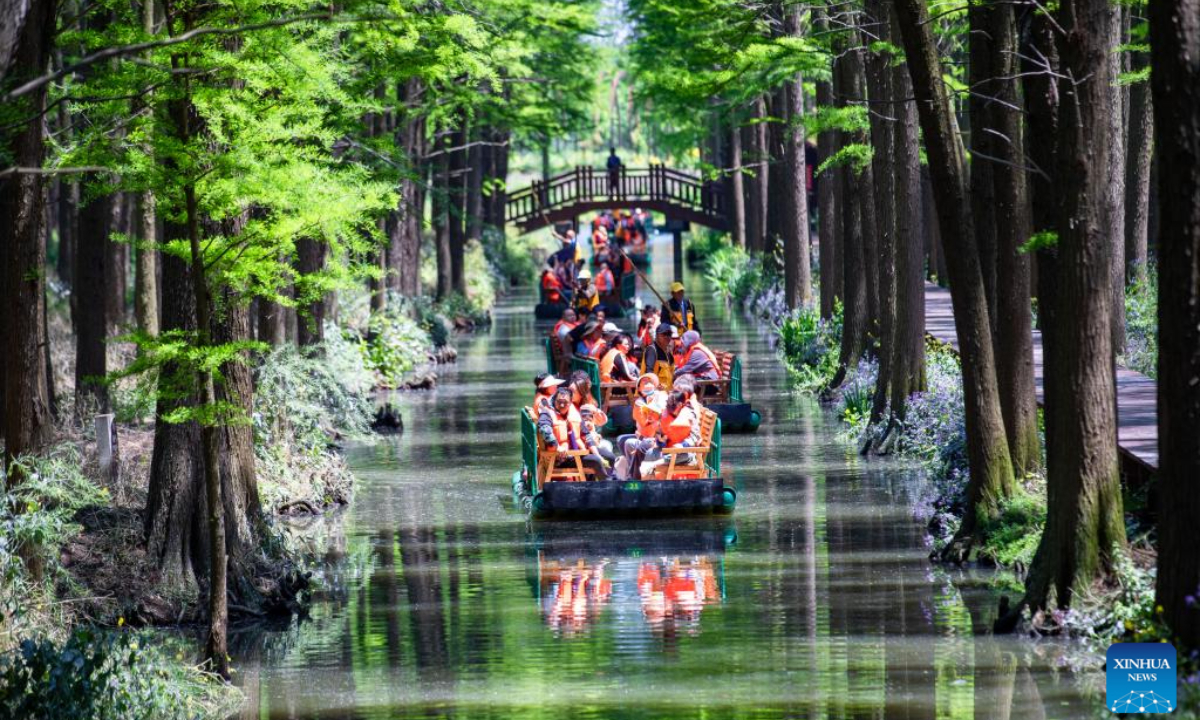 Tourists visit a national wetland park in Xinghua, east China's Jiangsu Province, May 1, 2024. Photo:Xinhua