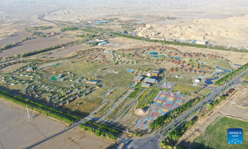 This aerial drone photo taken on May 2, 2024 shows a recreational vehicles (RV) camping park in Urho District of Karamay, northwest China's Xinjiang Uygur Autonomous Region. During the May Day holiday, Urho District of Karamay City has become a popular travel destination for tourists from all over the country. Various activities such as low-altitude flight, no-man's land crossing, RV camping, and off-road motorcycling have been carried out here to meet the diverse and personalized needs of tourists. In recent years, Xinjiang has taken full advantages of its rich natural resources to develop outdoor tourism projects and thus new growth opportunities have emerged in Xinjiang's thriving tourism industry. (Xinhua/Ding Lei)