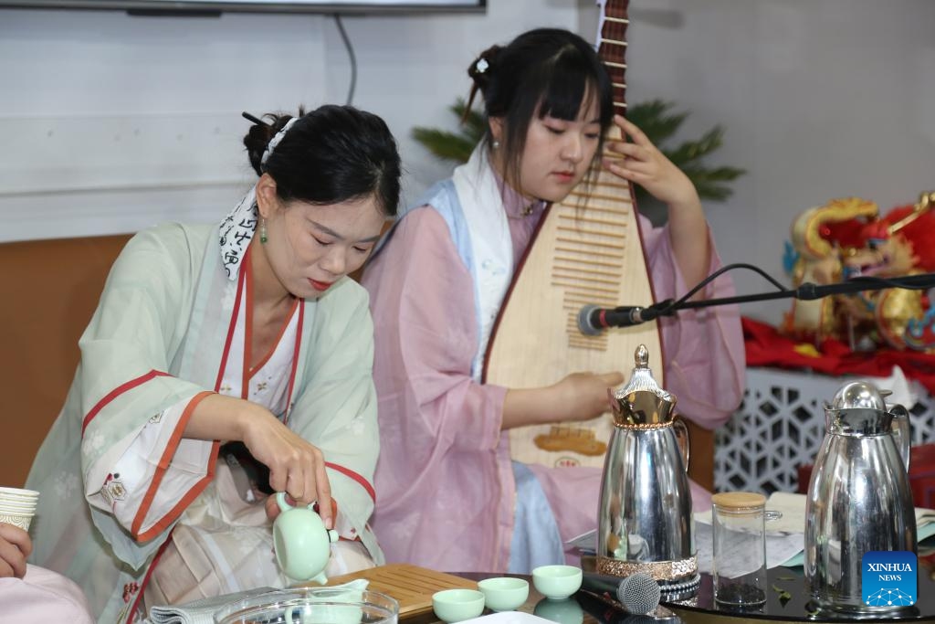 Teachers from the Confucius Institute at Carthage University in Tunisia perform tea art during the Chinese Culture Day in occasion of the 38th Tunis International Book Fair in Tunis, Tunisia, April 24, 2024.(Photo: Xinhua)