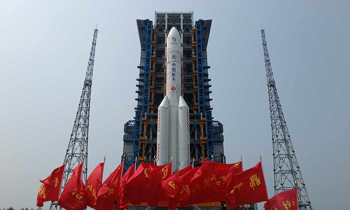 This photo taken on April 27, 2024 shows the combination of the Chang'e-6 lunar probe and the Long March-5 Y8 carrier rocket after being transferred vertically to the launching area at the Wenchang Space Launch Center in South China's Hainan Province. The Chang'e-6 lunar probe is scheduled for launch at an appropriate time at the beginning of May, according to the China National Space Administration. Photo: cnsphoto