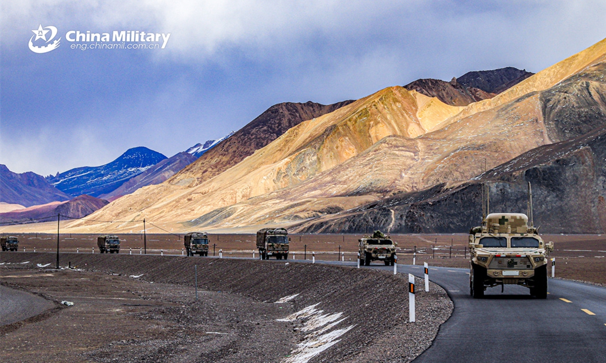 A convoy of military trucks attached to a regiment under the PLA Army is en route to the designated training field during a driving skill training exercise on April 12, 2024. (eng.chinamil.com.cn/Photo by Liu Jintao)