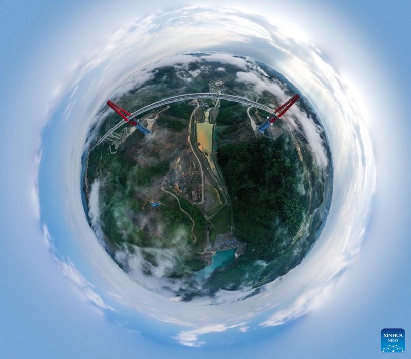 A drone panoramic photo taken on April 27, 2024 shows the Longli River bridge in Longli County, southwest China's Guizhou Province. The 1,260-meter-long bridge was completed and opened to traffic on Saturday. Photo: Xinhua