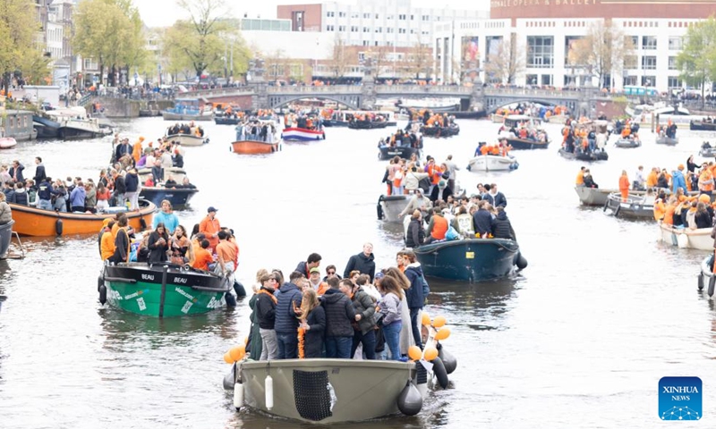 People celebrate King's Day in Amsterdam, the Netherlands, on April 27, 2024. King's Day is a national holiday in the Kingdom of the Netherlands, celebrated on April 27, King Willem-Alexander's birthday. Photo: Xinhua