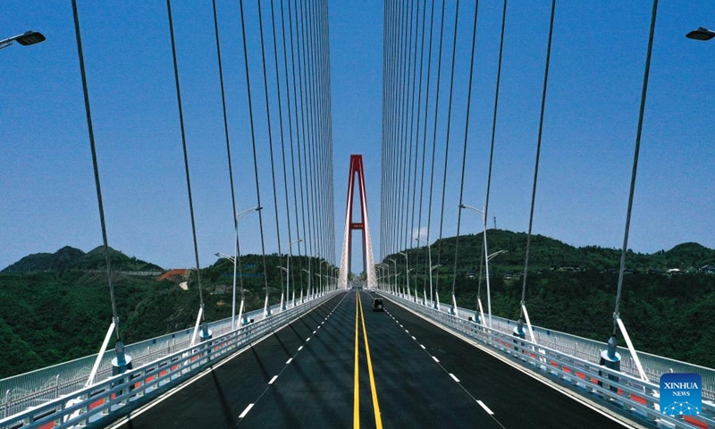A drone photo taken on April 26, 2024 shows the Longli River bridge in Longli County, southwest China's Guizhou Province. The 1,260-meter-long bridge was completed and opened to traffic on Saturday. Photo: Xinhua