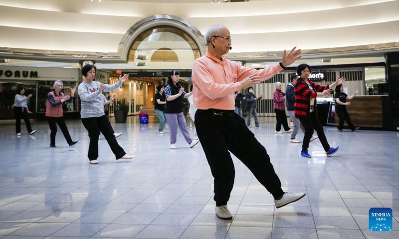 People practise Tai Chi inside a shopping mall on World Tai Chi Day in Richmond, Canada, on April 27, 2024. The World Tai Chi Day falls on the last Saturday of April. Photo: Xinhua