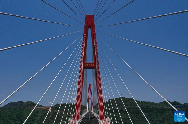A drone photo taken on April 26, 2024 shows the Longli River bridge in Longli County, southwest China's Guizhou Province. The 1,260-meter-long bridge was completed and opened to traffic on Saturday. Photo: Xinhua