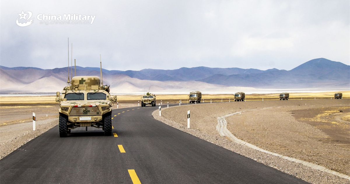 A convoy of military trucks attached to a regiment under the PLA Army is en route to the designated training field during a driving skill training exercise on April 12, 2024. (eng.chinamil.com.cn/Photo by Liu Jintao)