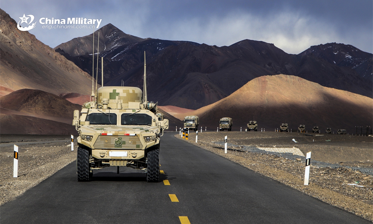 A convoy of military trucks attached to a regiment under the PLA Army is en route to the designated training field during a driving skill training exercise on April 12, 2024. (eng.chinamil.com.cn/Photo by Liu Jintao)