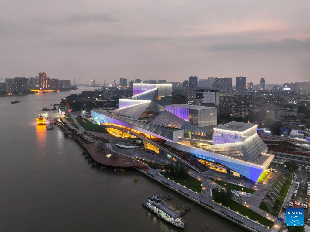 An aerial drone photo shows the Bai'etan Greater Bay Area Art Center in Guangzhou, south China's Guangdong Province, April 26, 2024. Housing the Guangdong Museum of Art, the Guangdong Intangible Cultural Heritage Exhibition Center, and the Guangdong Literature Hall, the art center will open to the public on May 1, 2024.(Photo: Xinhua)
