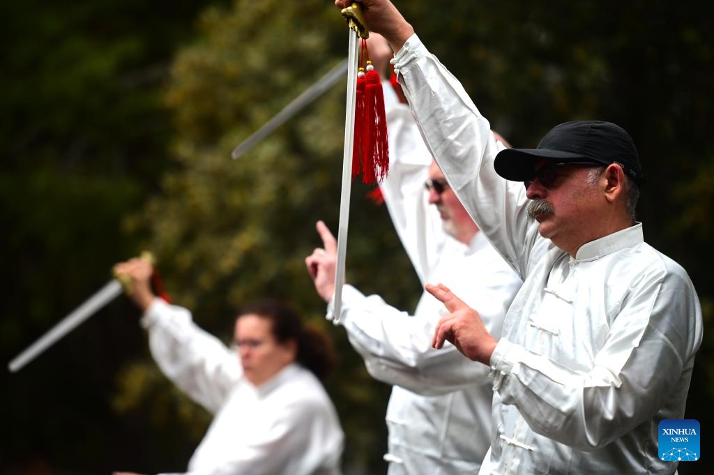 Tai Chi practitioners perform during a Chinese cultural event held at the Chinese Garden of Serenity in Santa Lucija, Malta, on April 27, 2024.(Photo: Xinhua)