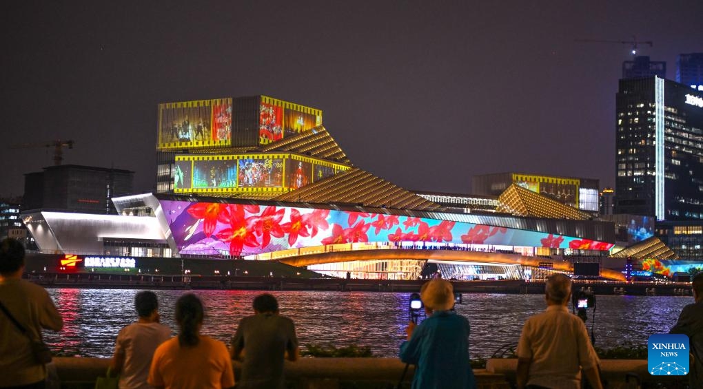 A light show is staged at the Bai'etan Greater Bay Area Art Center in Guangzhou, south China's Guangdong Province, April 28, 2024. Housing the Guangdong Museum of Art, the Guangdong Intangible Cultural Heritage Exhibition Center, and the Guangdong Literature Hall, the art center was inaugurated on Sunday.(Photo: Xinhua)