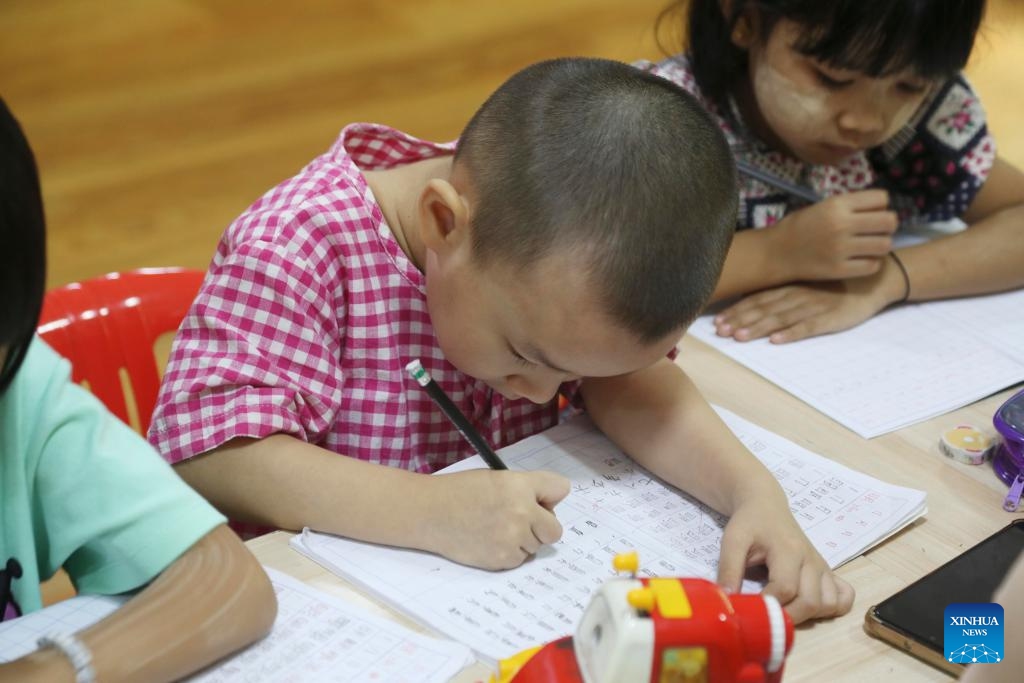 A child practices writing Chinese characters during a class in Yangon, Myanmar, April 28, 2024.(Photo: Xinhua)