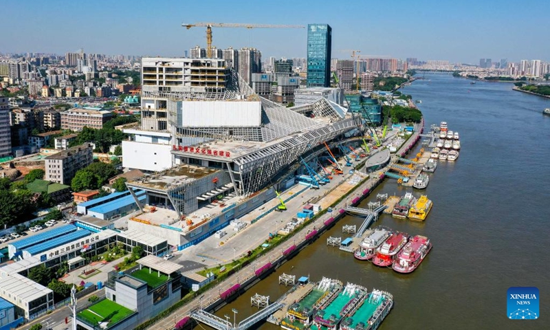 An aerial drone photo shows the Bai'etan Greater Bay Area Art Center under construction in Guangzhou, south China's Guangdong Province, Oct. 12, 2022. Housing the Guangdong Museum of Art, the Guangdong Intangible Cultural Heritage Exhibition Center, and the Guangdong Literature Hall, the art center will open to the public on May 1, 2024.(Photo: Xinhua)