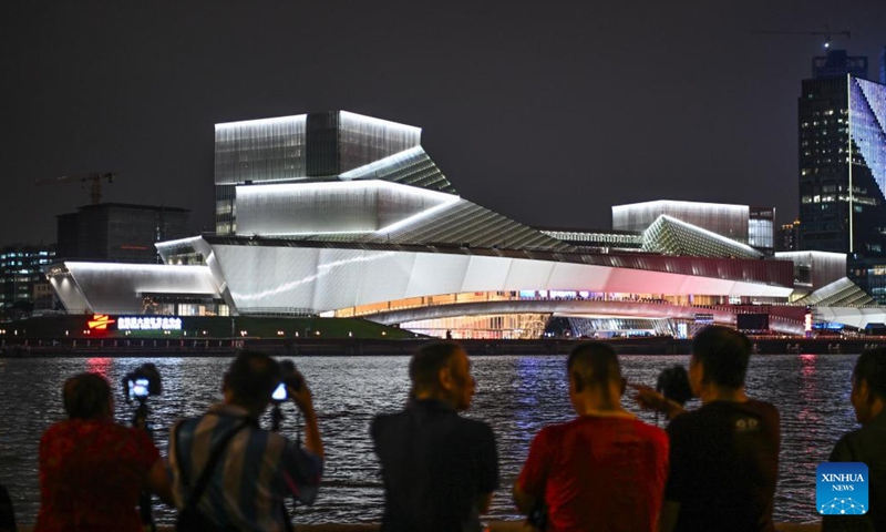 A light show is staged at the Bai'etan Greater Bay Area Art Center in Guangzhou, south China's Guangdong Province, April 28, 2024. Housing the Guangdong Museum of Art, the Guangdong Intangible Cultural Heritage Exhibition Center, and the Guangdong Literature Hall, the art center was inaugurated on Sunday.(Photo: Xinhua)