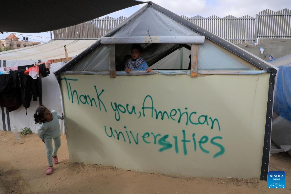 A tent with signs of gratitude is seen in the southern Gaza Strip city of Rafah on April 27, 2024. Pro-Palestinian demonstrations are spreading on campuses across the United States as the Israel-Hamas conflict in Gaza continues. In the southern Gaza Strip city of Rafah, people write signs of gratitude towards those students on tents.(Photo: Xinhua)